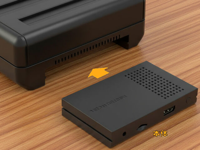 レトロフリーク本体とカートリッジアダプターを合体させている画像です。